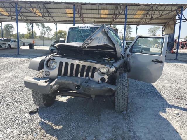 1C4BJWDG2GL189288 - 2016 JEEP WRANGLER U SPORT SILVER photo 5