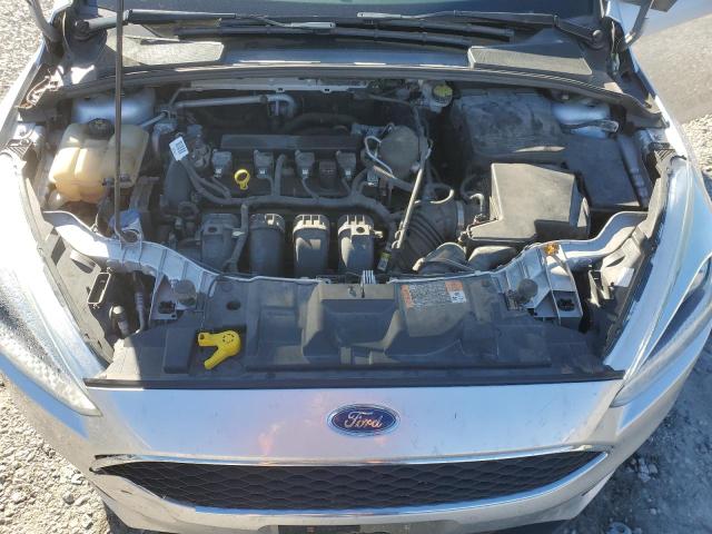 1FADP3E24FL299966 - 2015 FORD FOCUS S SILVER photo 11