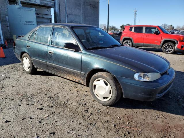 1Y1SK5285WZ421649 - 1998 CHEVROLET GEO PRIZM BASE GREEN photo 4