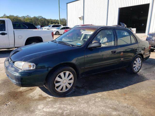 1Y1SK5288XZ413000 - 1999 CHEVROLET GEO PRIZM BASE GREEN photo 1