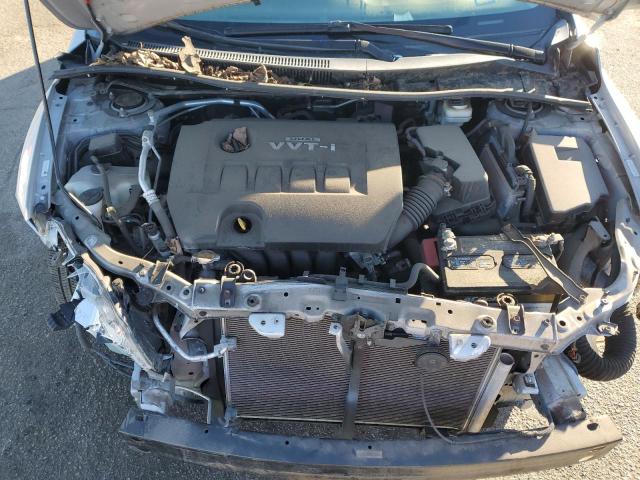 1NXBU40E99Z126472 - 2009 TOYOTA COROLLA BASE Silber Foto 11