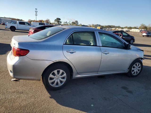 1NXBU40E99Z126472 - 2009 TOYOTA COROLLA BASE Silber Foto 3