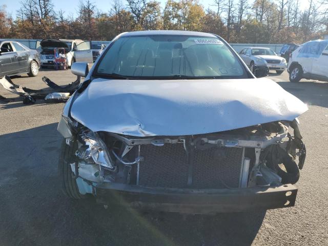 1NXBU40E99Z126472 - 2009 TOYOTA COROLLA BASE Silber Foto 5