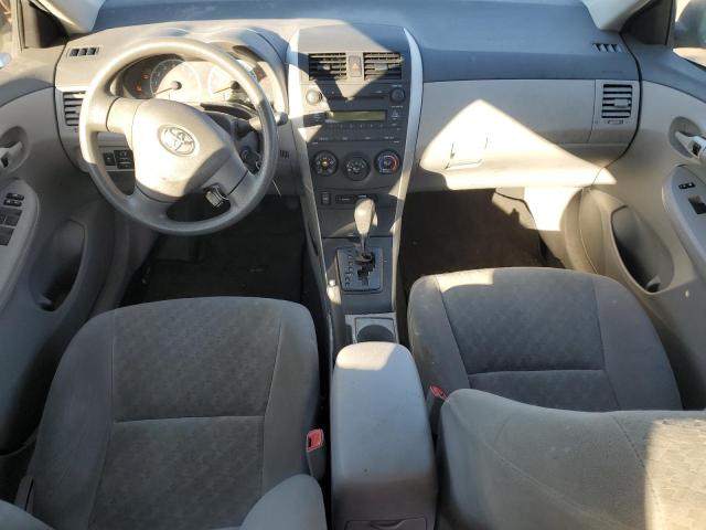 1NXBU40E99Z126472 - 2009 TOYOTA COROLLA BASE Silber Foto 8