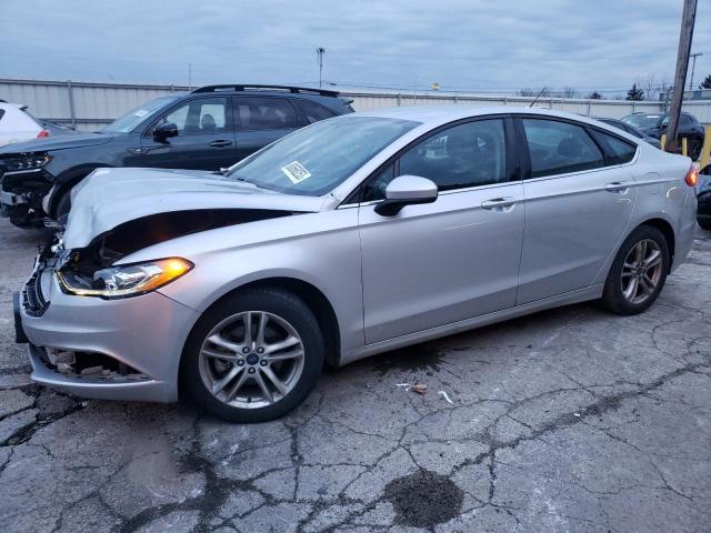 3FA6P0H7XJR165679 - 2018 FORD FUSION SE SILVER photo 1