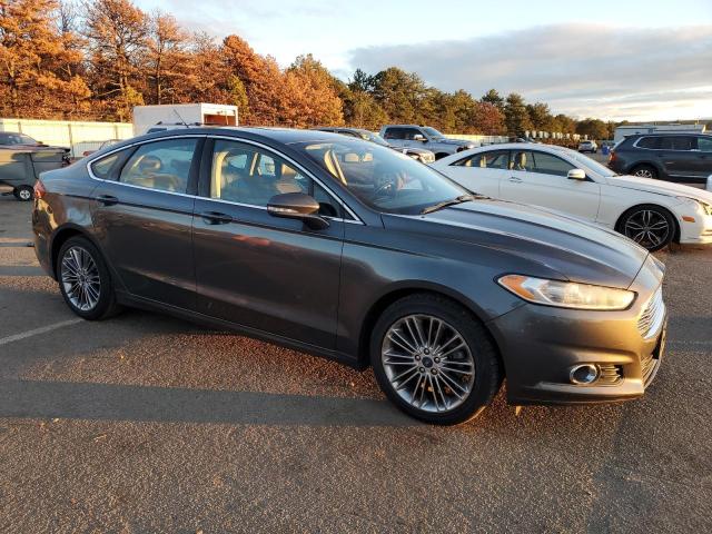 3FA6P0H92FR140901 - 2015 FORD FUSION SE GRAY photo 4