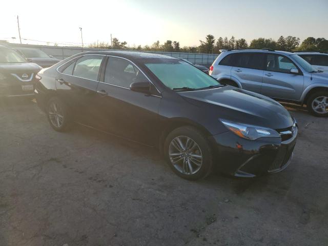 4T1BF1FK4GU138340 - 2016 TOYT CAMRY LE BLACK photo 4