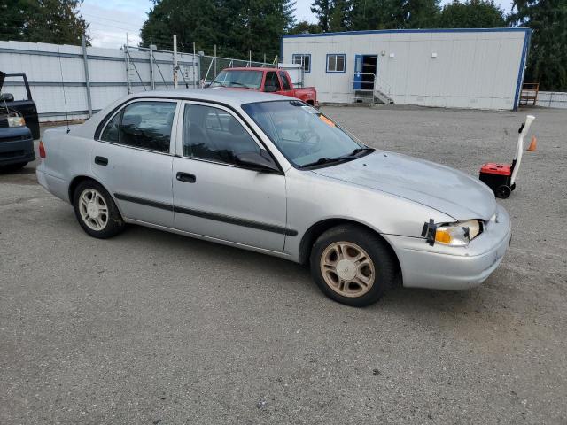 1Y1SK5282YZ435916 - 2000 CHEVROLET GEO PRIZM BASE SILVER photo 4