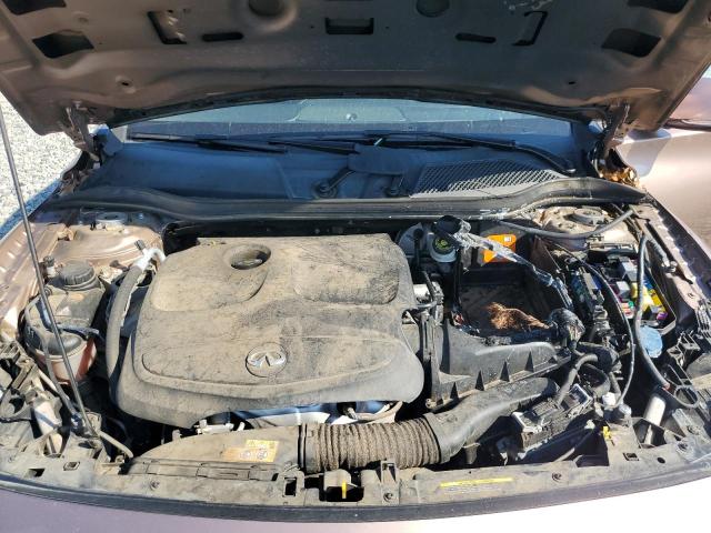 SJKCH5CP6JA044072 - 2018 INFINITI QX30 BASE PINK photo 12