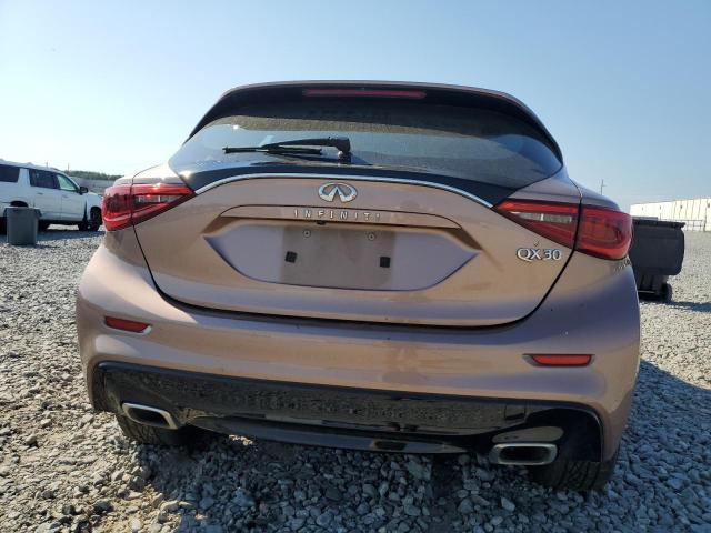 SJKCH5CP6JA044072 - 2018 INFINITI QX30 BASE PINK photo 6