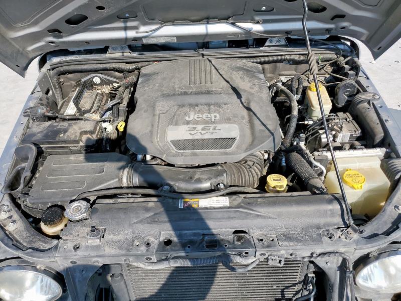 1C4HJWDG7DL690781 - 2013 JEEP WRANGLER U SPORT SILVER photo 12