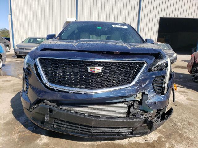 1GYFZER41MF012531 - 2021 CADILLAC XT4 SPORT BLUE photo 5