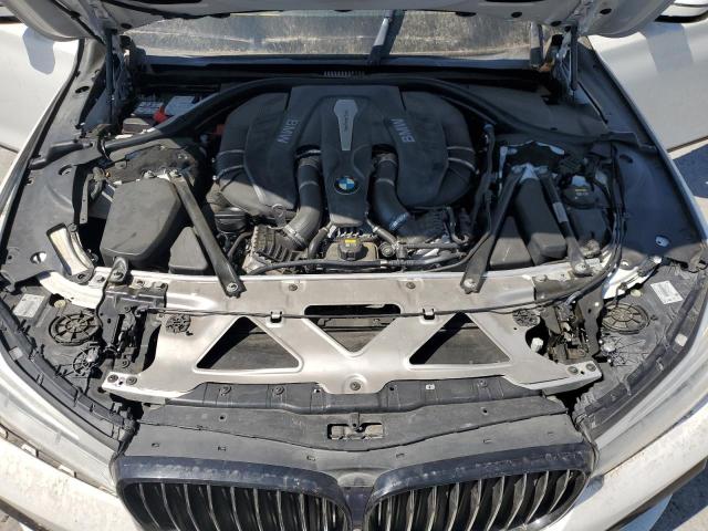 WBA7F0C54HGM21014 - 2017 BMW 750 I Белый фото 11
