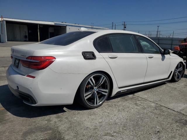 WBA7F0C54HGM21014 - 2017 BMW 750 I Белый фото 3