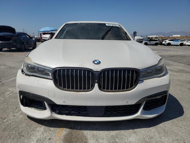 WBA7F0C54HGM21014 - 2017 BMW 750 I Белый фото 5