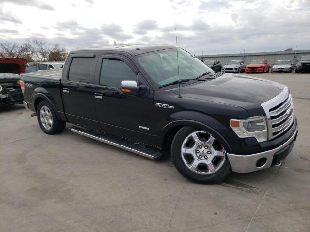 1FTFW1ETXEFB59369 - 2014 FORD F150 SUPERCREW BLACK photo 4