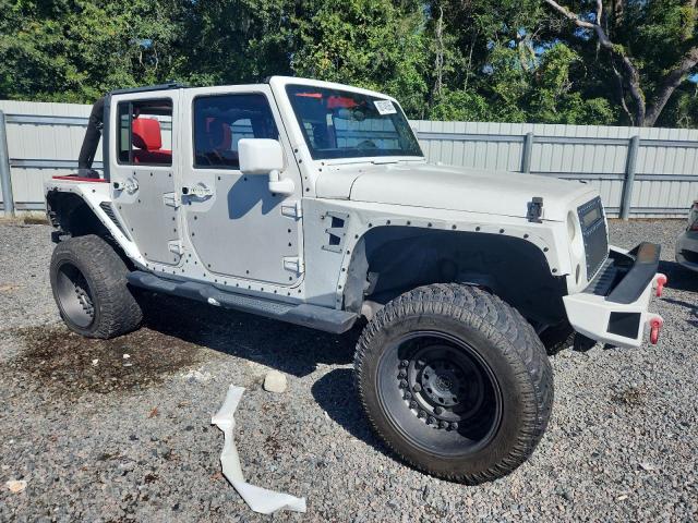 1J4BA3H10BL622520 - 2011 JEEP WRANGLER UNLIMITED SPORT WHITE photo 4