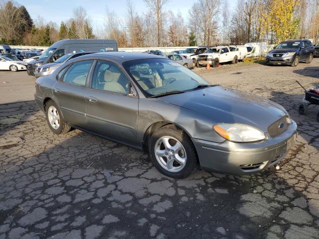 1FAFP53U44G138998 - 2004 FORD TAURUS 4D SE GREEN photo 4