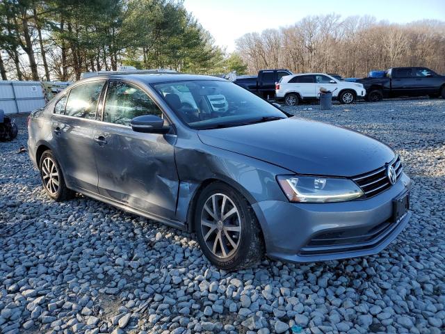 3VWDB7AJ9HM392770 - 2017 VOLKSWAGEN JETTA SE GRAY photo 4