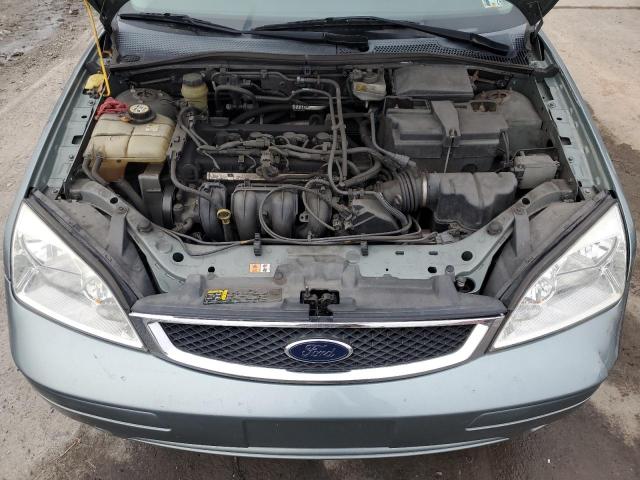 1FAFP34N86W127409 - 2006 FORD FOCUS ZX4 GREEN photo 11