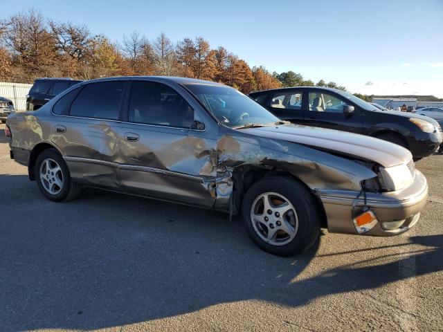 4T1BF18B8XU295396 - 1999 TOYOTA AVALON XL TAN photo 4