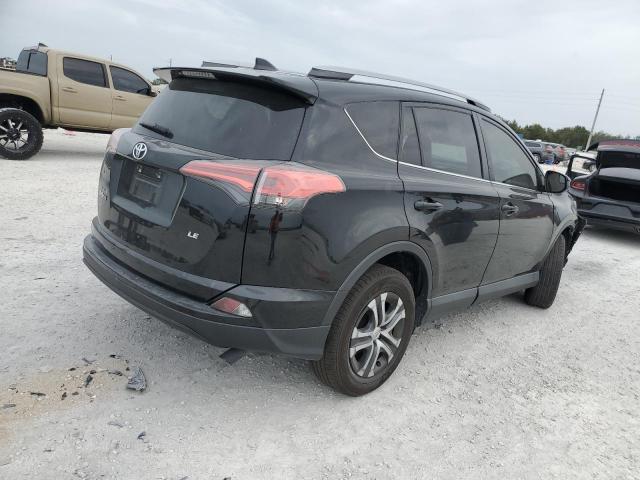 2T3ZFREV6JW437013 - 2018 TOYOTA RAV4 LE BLACK photo 3