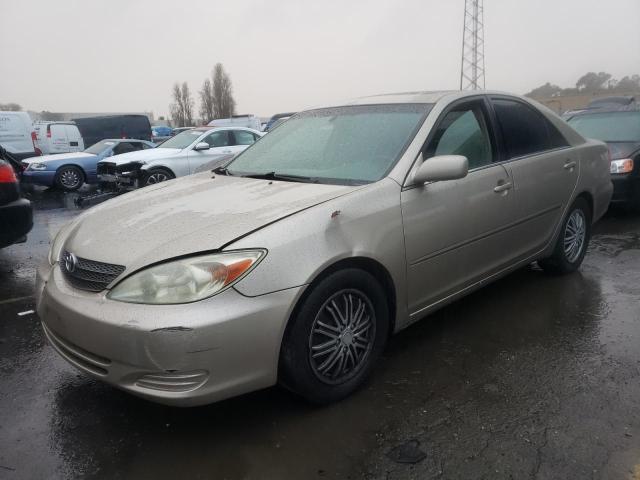 JTDBF30K820062114 - 2002 TOYOTA CAMRY LE GOLD photo 1