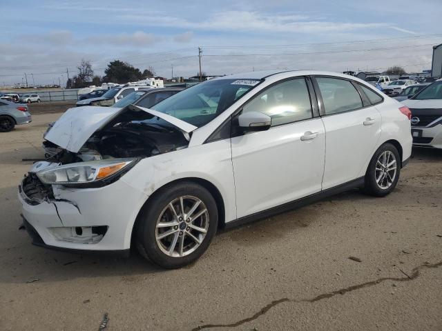 1FADP3F24FL307885 - 2015 FORD FOCUS SE WHITE photo 1