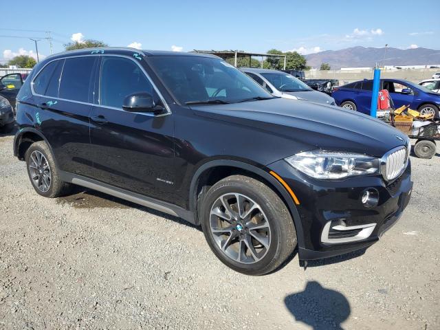 5UXKR2C56J0Z21737 - 2018 BMW X5 SDRIVE35I BLACK photo 4