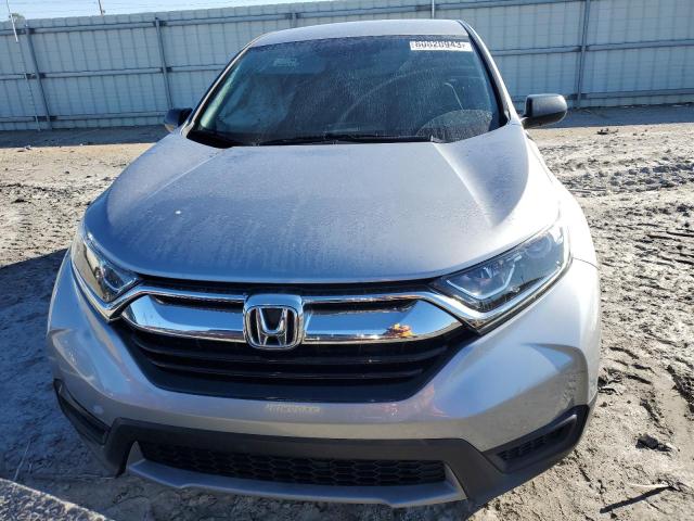 2HKRW5H31JH425989 - 2018 HONDA CR-V LX SILVER photo 5