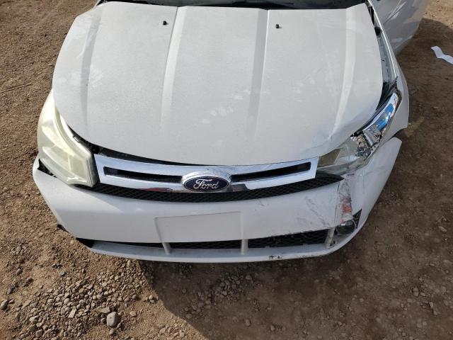 1FAHP37NX9W125718 - 2009 FORD FOCUS SEL WHITE photo 11