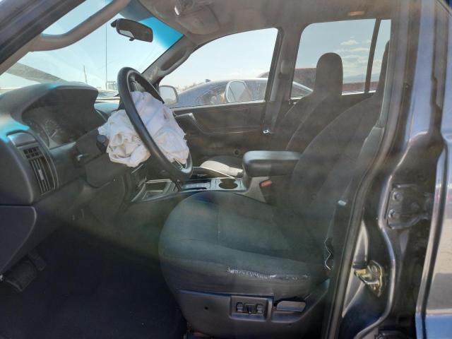 1J4GW48S24C123307 - 2004 JEEP GRAND CHER LAREDO BLUE photo 7