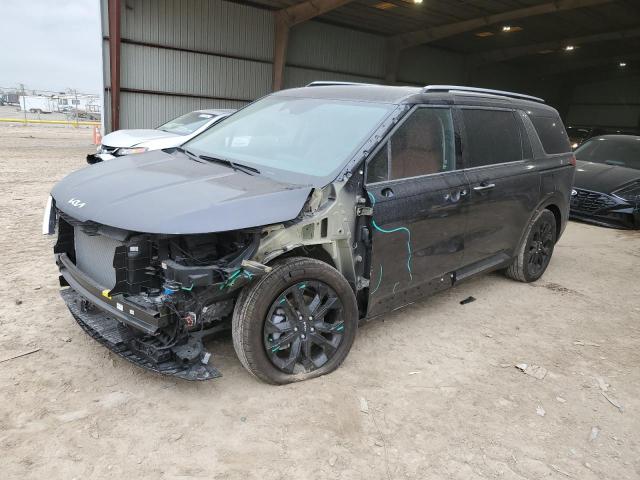 KNDNE5H35R6302056 - 2024 KIA CARNIVAL SX BLACK photo 1