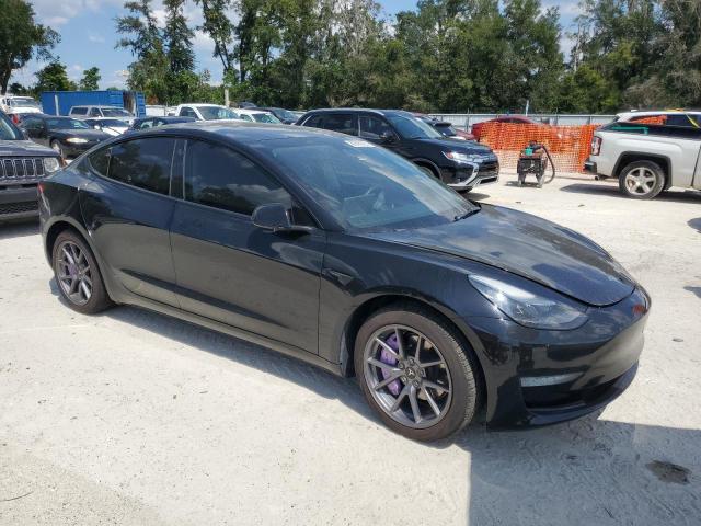 5YJ3E1EAXPF452572 - 2023 TESLA MODEL 3 BLACK photo 4
