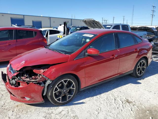 1FAHP3F28CL392288 - 2012 FORD FOCUS SE RED photo 1