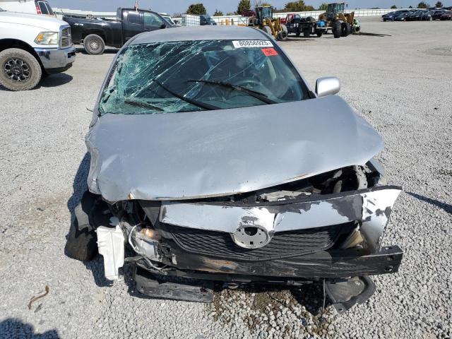1NXBU40E39Z036623 - 2009 TOYOTA COROLLA BASE Silber Foto 5