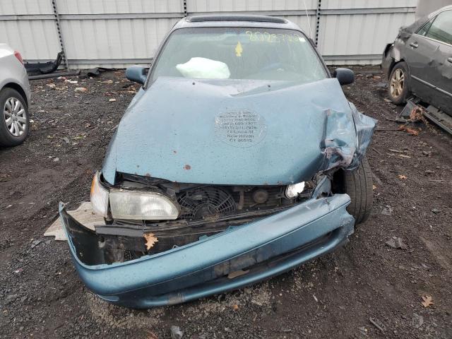 2T1BB02E4TC165281 - 1996 TOYOTA COROLLA DX BLUE photo 5