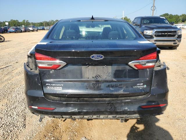 3FA6P0LU0KR266664 - 2019 FORD FUSION SE Schwarz Foto 6
