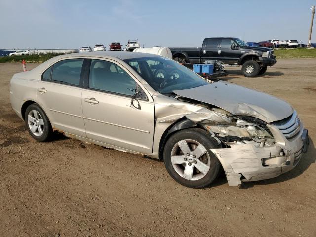3FAFP07Z66R211342 - 2006 FORD FUSION SE GOLD photo 4