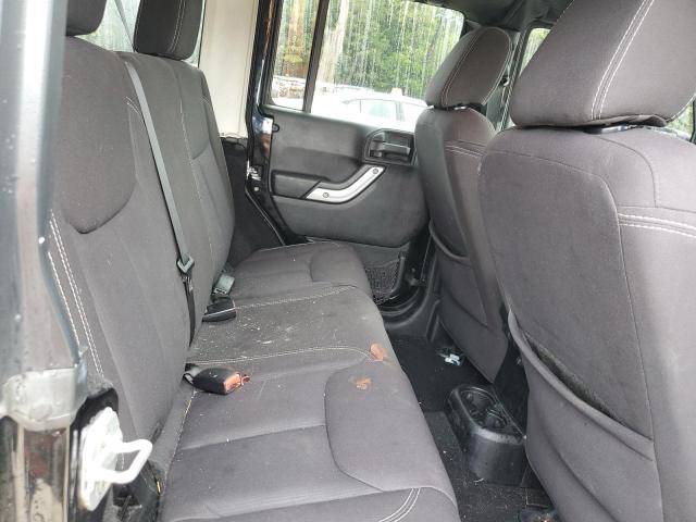 1C4BJWEG8DL501740 - 2013 JEEP WRANGLER UNLIMITED SAHARA BLACK photo 11