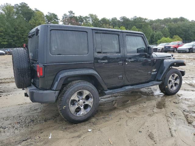 1C4BJWEG8DL501740 - 2013 JEEP WRANGLER UNLIMITED SAHARA BLACK photo 3