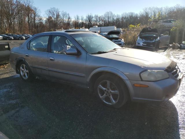 JN1CA31D51T600335 - 2001 NISSAN MAXIMA GXE SILVER photo 4