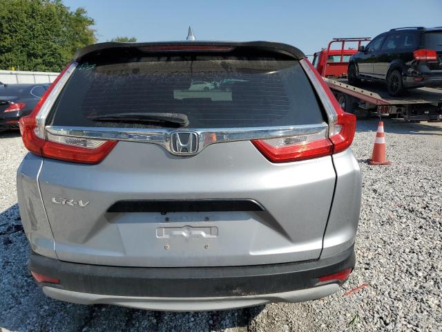 2HKRW5H31JH416841 - 2018 HONDA CR-V LX Argent photo 6