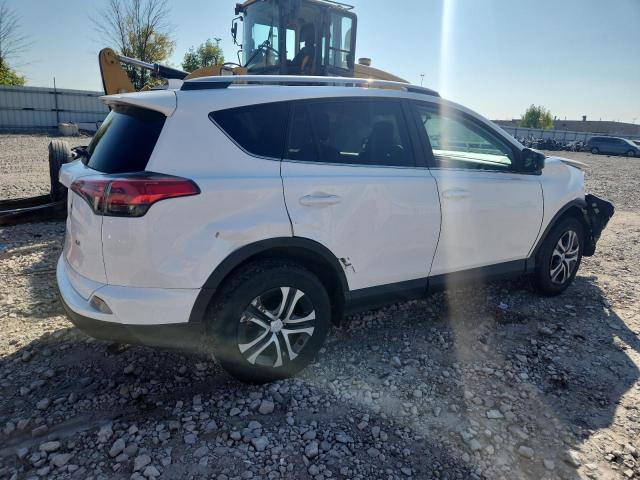 2T3ZFREV6GW295707 - 2016 TOYOTA RAV4 LE WHITE photo 3