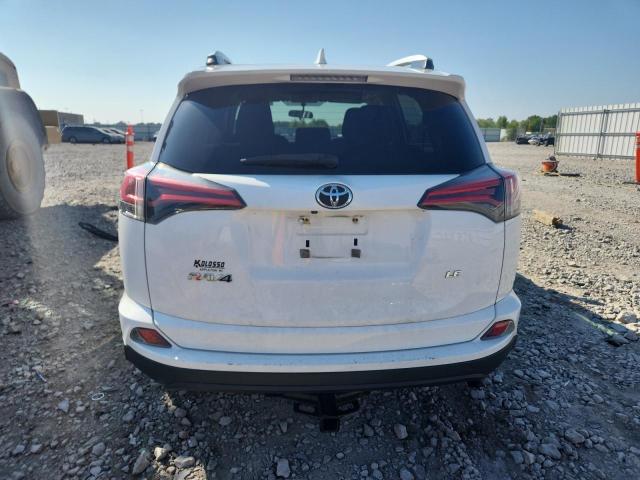 2T3ZFREV6GW295707 - 2016 TOYOTA RAV4 LE WHITE photo 6