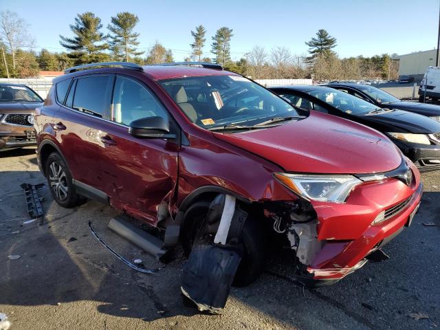 2T3BFREV1JW770379 - 2018 TOYOTA RAV4 LE RED photo 4