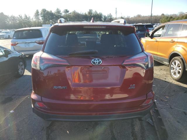 2T3BFREV1JW770379 - 2018 TOYOTA RAV4 LE RED photo 6