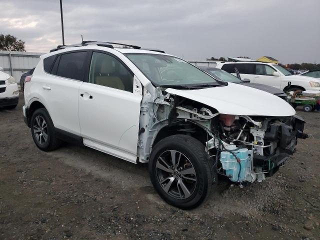 JTMWFREV2HD102812 - 2017 TOYOTA RAV4 XLE WHITE photo 4