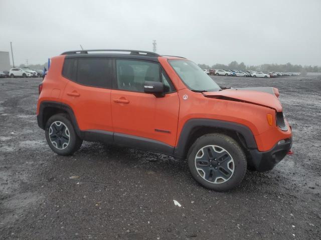 ZACCJBCT4GPD85823 - 2016 JEEP RENEGADE TRAILHAWK ORANGE photo 4