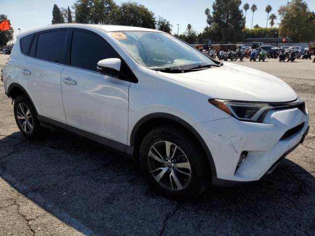 JTMWFREV2HJ718284 - 2017 TOYOTA RAV4 XLE WHITE photo 4